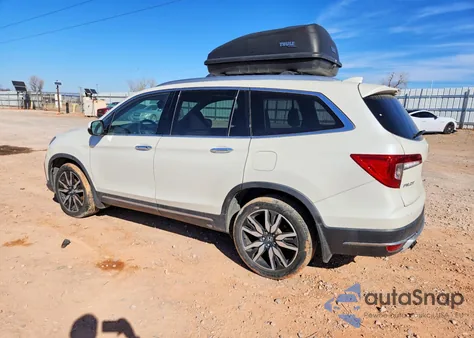 2019 Honda Pilot Touring z USA, uszkodzony, nr VIN 5FNYF6H94KB039511